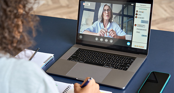 person participating in a video call on a laptop discussing topics related to online meetings and virtual communication 2 important lessons